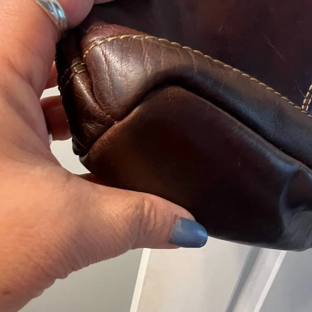 Jack George’s brown leather back pack